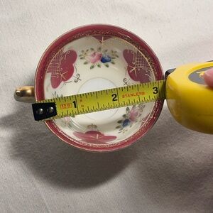 Elegant Floral Teacup with Gold Handle